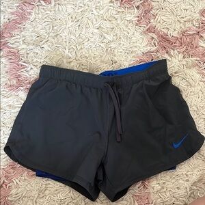 Nike Black Shorts with Blue Swoosh